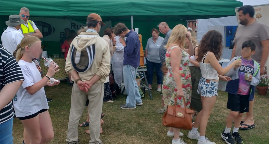 crowd of people outside our marquee